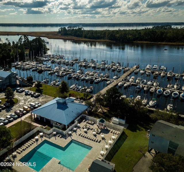 birds eye view of property featuring a water view