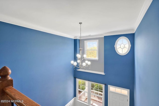 4301 Peeble Dr, Wilmington, NC 28412 - interior space with an inviting chandelier and ornamental molding