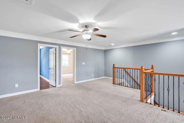 4301 Peeble Dr, Wilmington, NC 28412 - spare room with carpet flooring, a ceiling fan, baseboards, and ornamental molding