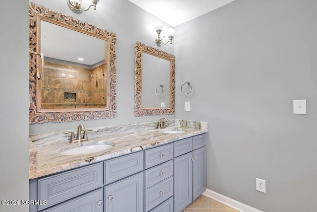 4301 Peeble Dr, Wilmington, NC 28412 - full bathroom featuring a tile shower, tile patterned flooring, a sink, and double vanity