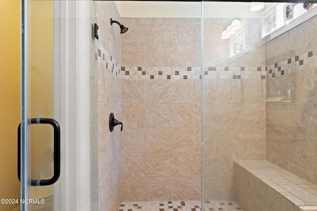 bathroom featuring walk in shower