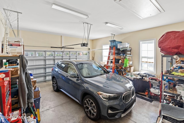 garage featuring a garage door opener