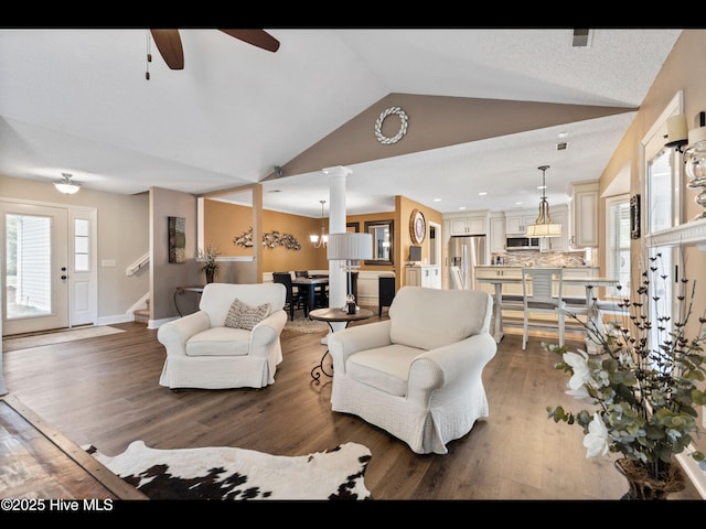 1204 Maple Ridge Rd, Wilmington, NC 28411 - living area featuring vaulted ceiling, ceiling fan, healthy amount of natural light, and light wood-style floors