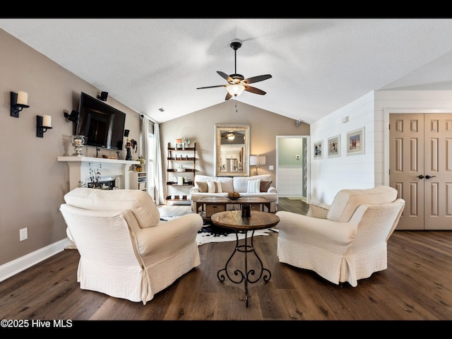 1204 Maple Ridge Rd, Wilmington, NC 28411 - living room featuring ceiling fan, wood finished floors, a fireplace, and lofted ceiling