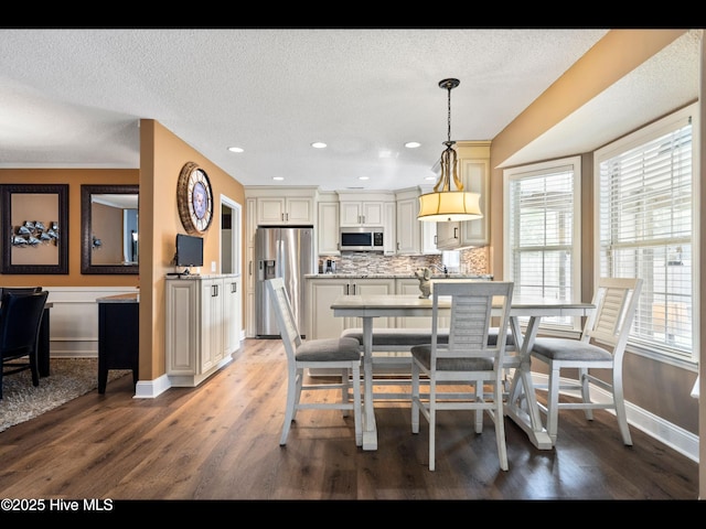 1204 Maple Ridge Rd, Wilmington, NC 28411 - dining space featuring light wood-style flooring, healthy amount of natural light, recessed lighting, and a textured ceiling
