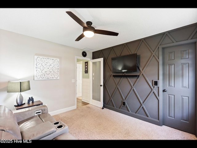1204 Maple Ridge Rd, Wilmington, NC 28411 - living room with carpet, a ceiling fan, and a decorative wall