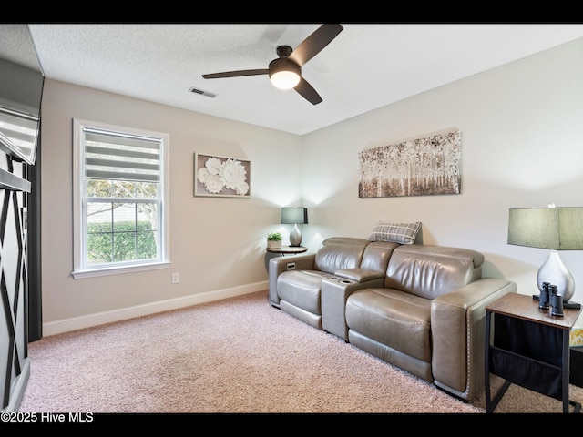 1204 Maple Ridge Rd, Wilmington, NC 28411 - living area with ceiling fan and carpet flooring