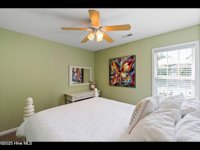1204 Maple Ridge Rd, Wilmington, NC 28411 - bedroom with carpet flooring and a ceiling fan