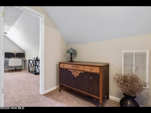 1204 Maple Ridge Rd, Wilmington, NC 28411 - additional living space with light carpet, vaulted ceiling, and a desk