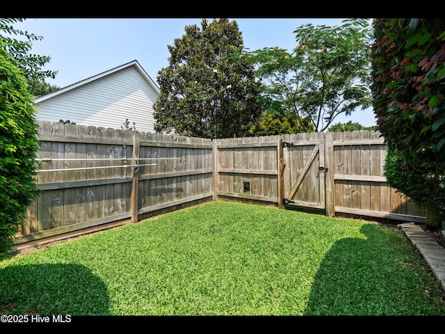 1204 Maple Ridge Rd, Wilmington, NC 28411 - fenced backyard with a gate
