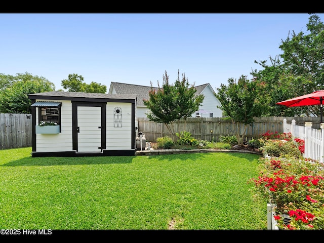 1204 Maple Ridge Rd, Wilmington, NC 28411 - fenced backyard featuring a storage shed