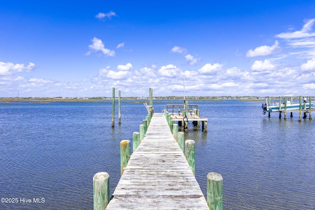 10002 Coast Guard Rd, Emerald Isle, NC 28594 - dock featuring a water view and boat lift
