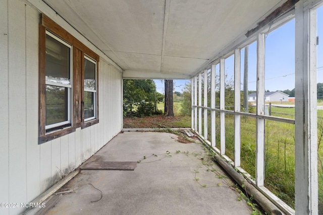 unfurnished sunroom with a healthy amount of sunlight