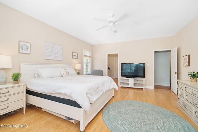 bedroom featuring ceiling fan and light wood-type flooring