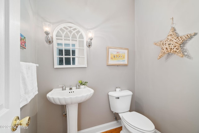 bathroom with sink and toilet