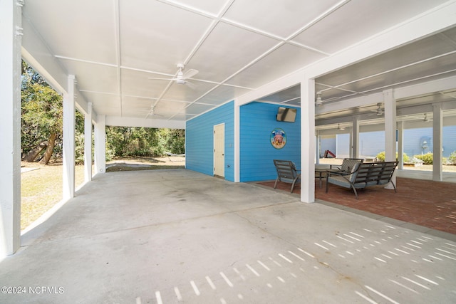 view of patio featuring an outdoor living space and ceiling fan