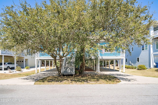 view of front of property with a carport