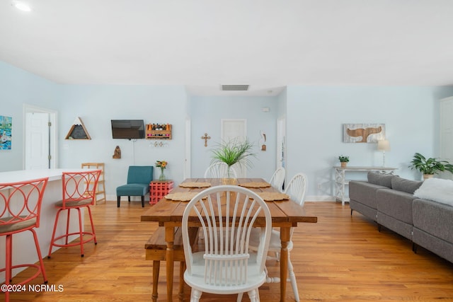 dining area featuring light hardwood / wood-style floors