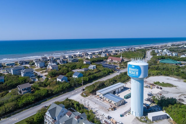 aerial view featuring a view of the beach and a water view