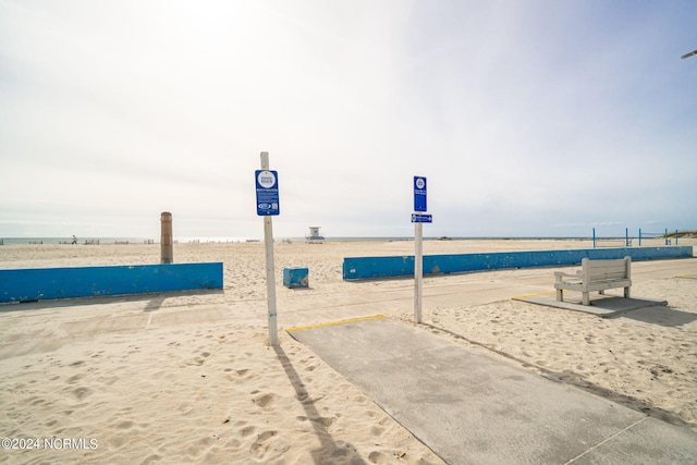 surrounding community featuring a water view