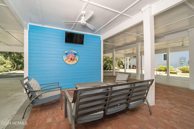 view of patio / terrace with an outdoor living space and ceiling fan