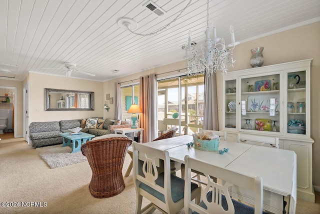 carpeted dining space featuring a notable chandelier and wooden ceiling