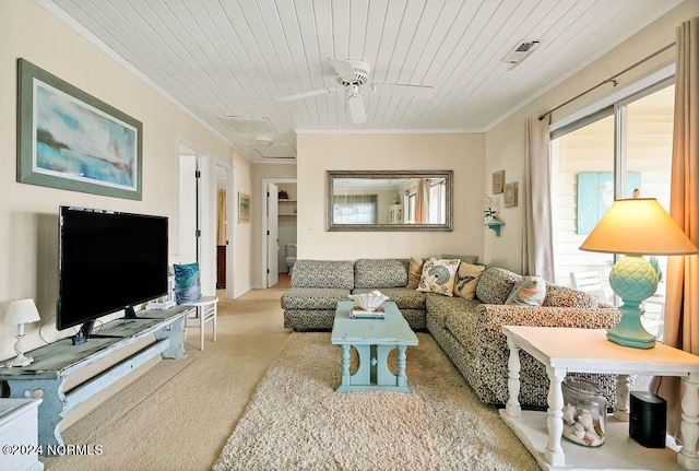 living room featuring ceiling fan, ornamental molding, wooden ceiling, and light carpet