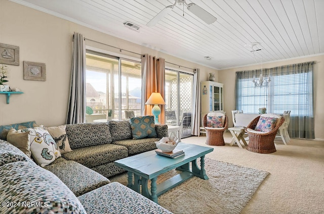 living room with wood ceiling, carpet, and a healthy amount of sunlight