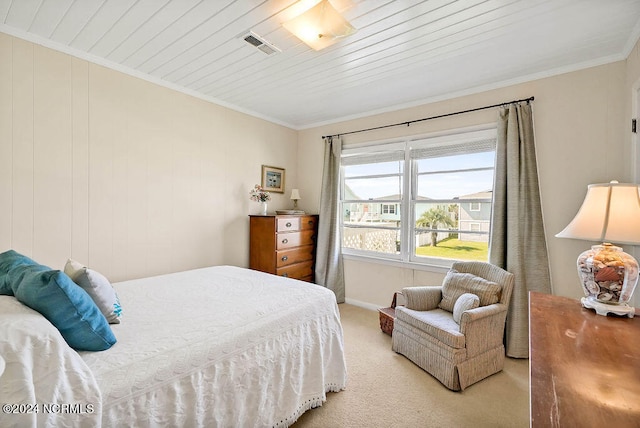 carpeted bedroom with crown molding and wooden ceiling