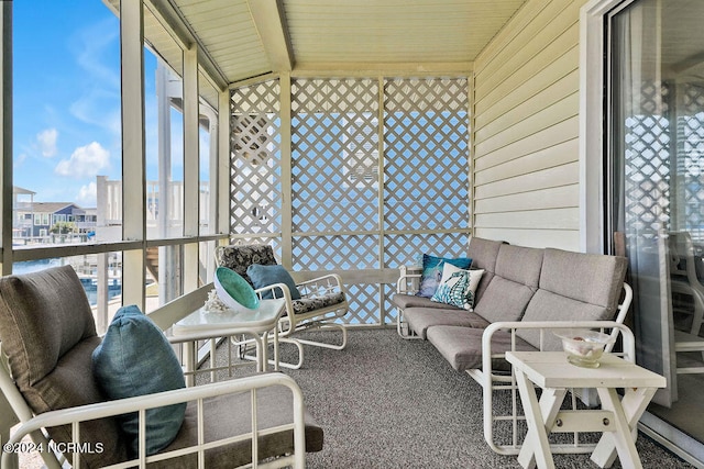 sunroom / solarium with wooden ceiling and vaulted ceiling with beams