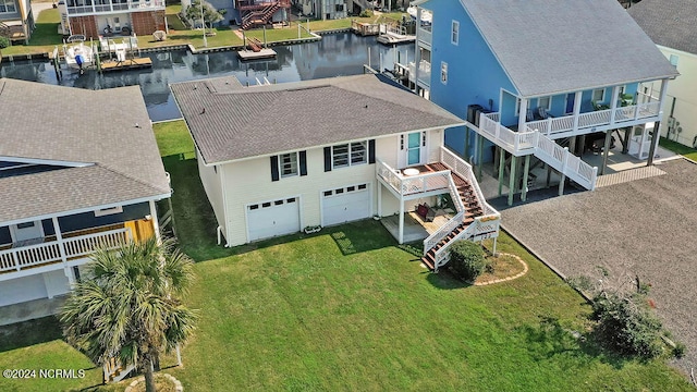 aerial view featuring a water view