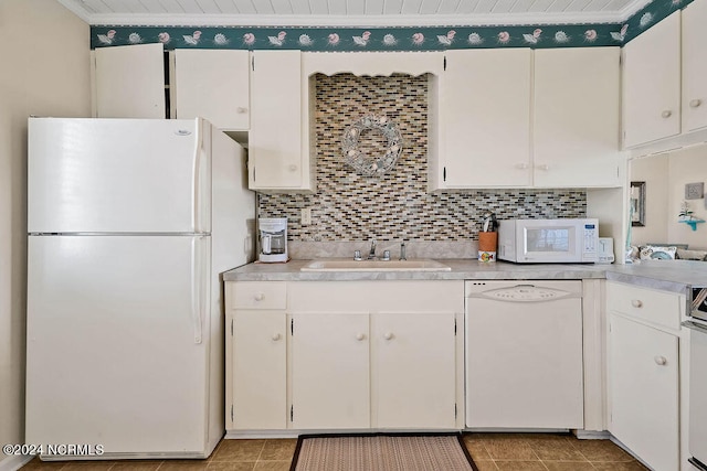 kitchen featuring white cabinets, wood ceiling, sink, white appliances, and tasteful backsplash