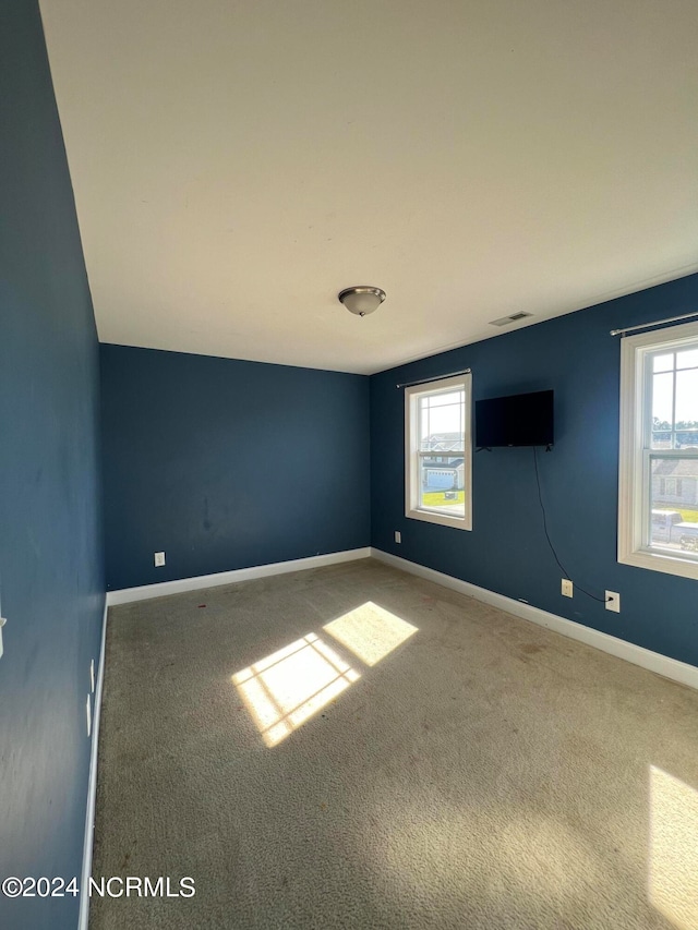 empty room featuring carpet