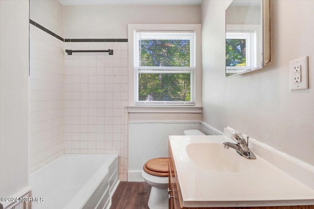 601 S Andrews Ave, Goldsboro, NC 27530 - full bath featuring toilet, bathtub / shower combination, wood finished floors, and vanity