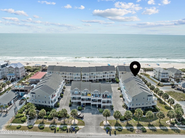 aerial view with a beach view and a water view