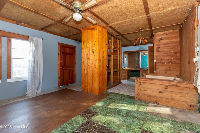 spare room featuring ceiling fan and wood-type flooring