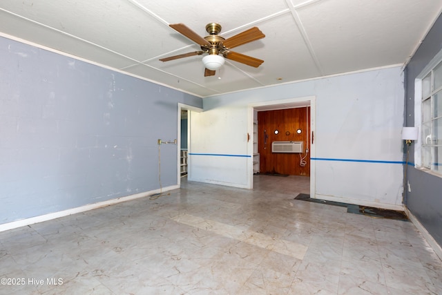 unfurnished room with ceiling fan and an AC wall unit