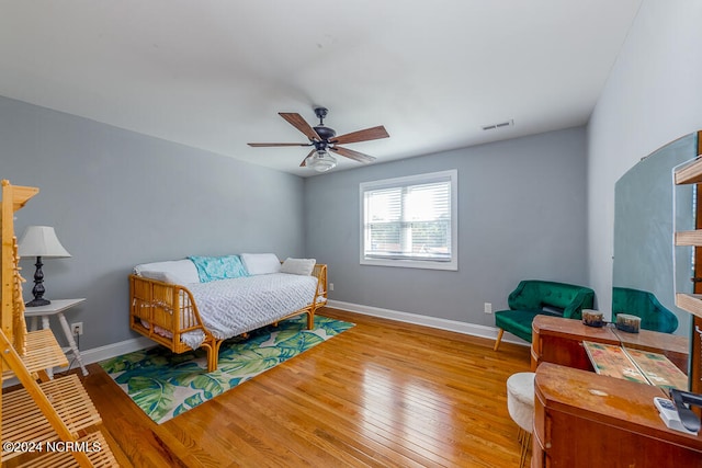 bedroom featuring light wood-type flooring and ceiling fan