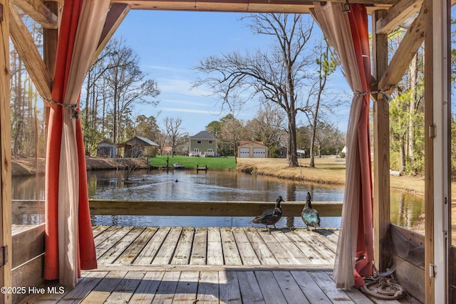 dock area featuring a water view