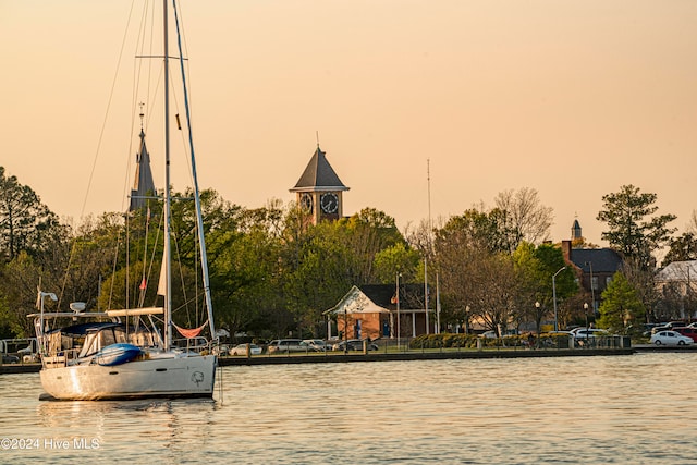 view of community with a water view