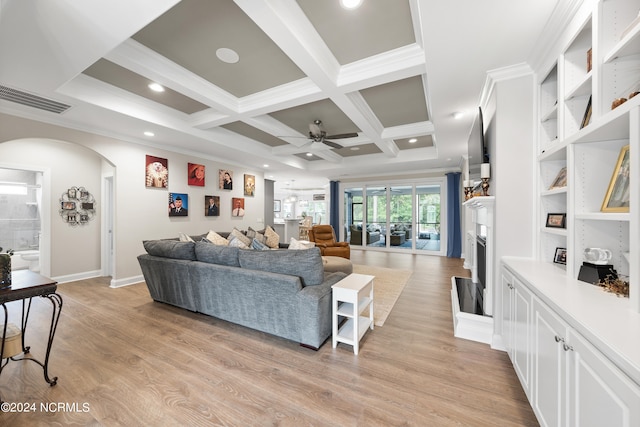 living room featuring beamed ceiling, coffered ceiling, ceiling fan, and light hardwood / wood-style flooring