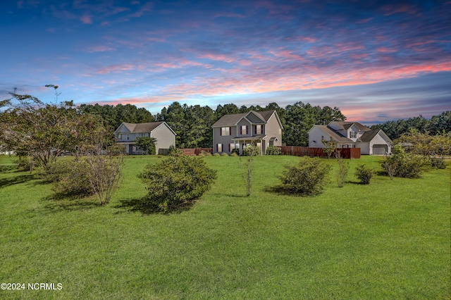 view of front of house featuring a yard