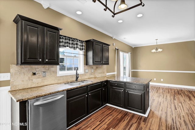 kitchen with stainless steel dishwasher, a healthy amount of sunlight, dark hardwood / wood-style flooring, and sink