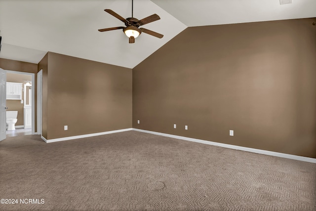 interior space featuring ceiling fan and lofted ceiling