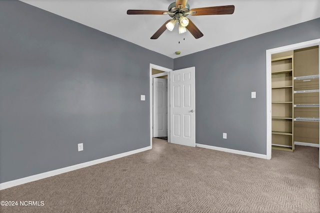 unfurnished bedroom with carpet floors, a closet, and ceiling fan