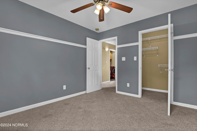 unfurnished bedroom featuring ceiling fan, light colored carpet, and a closet