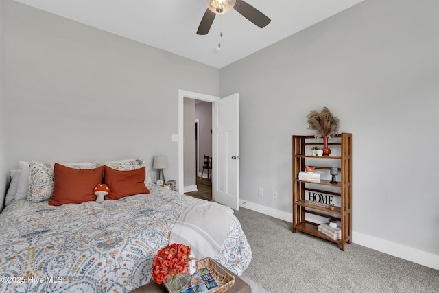 1399 Hammocks Beach Rd, Swansboro, NC 28584 - carpeted bedroom with baseboards and ceiling fan