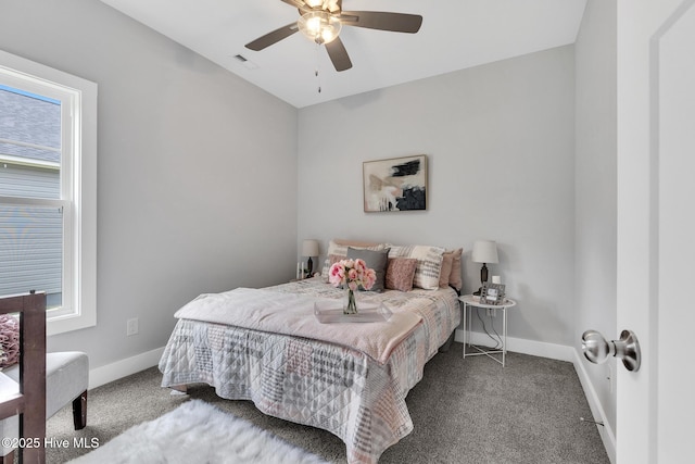 1399 Hammocks Beach Rd, Swansboro, NC 28584 - bedroom featuring carpet floors, baseboards, and a ceiling fan