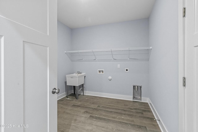 1399 Hammocks Beach Rd, Swansboro, NC 28584 - washroom featuring hookup for an electric dryer, hookup for a washing machine, hookup for a gas dryer, wood finished floors, and baseboards