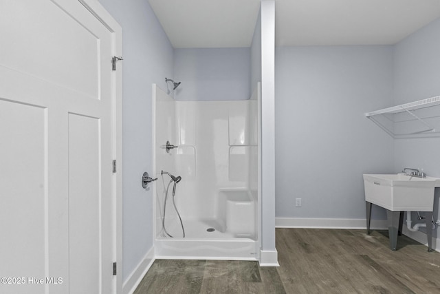 1399 Hammocks Beach Rd, Swansboro, NC 28584 - full bath with a shower, wood finished floors, and baseboards